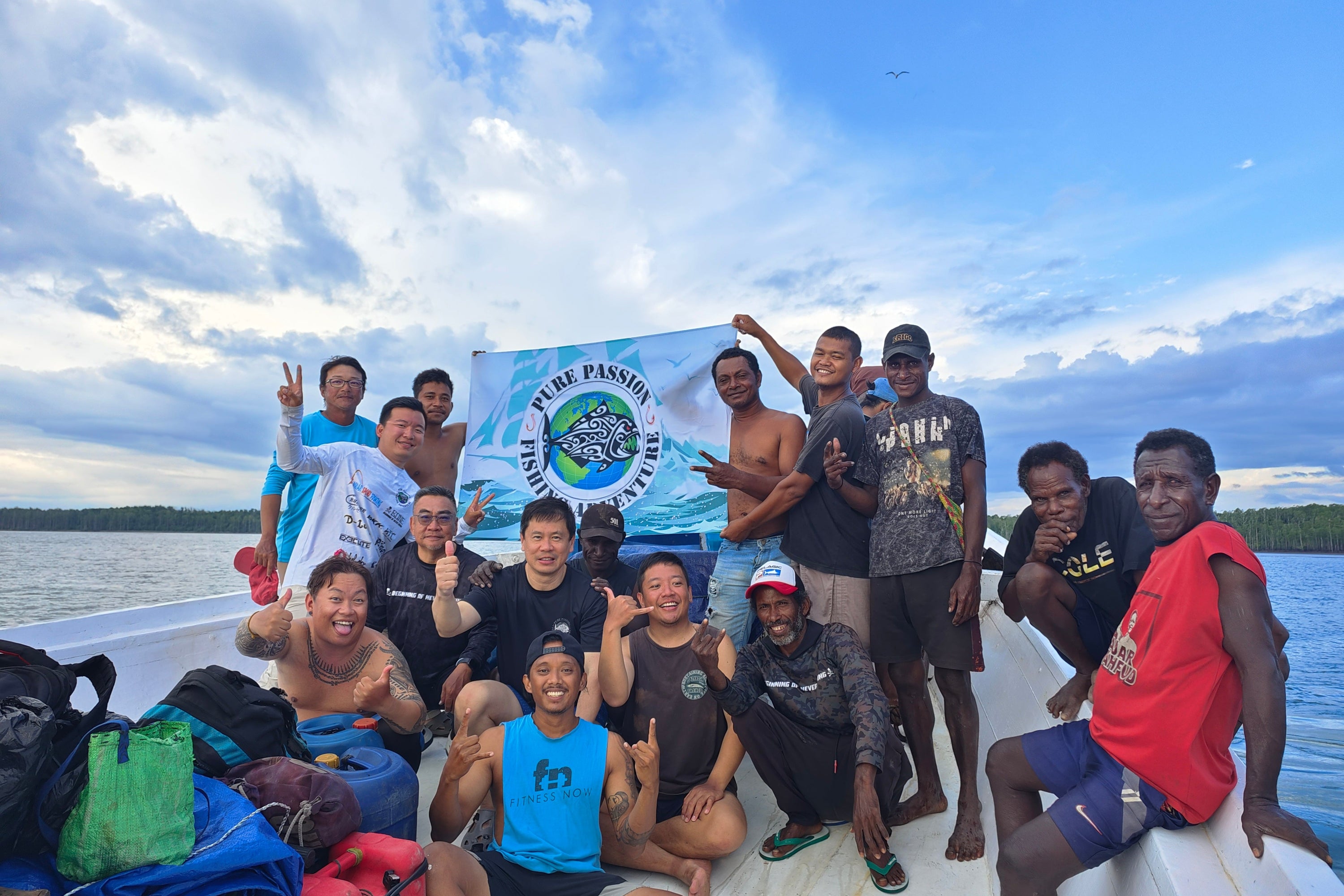 PPFA anglers together on a fishing boat with the Pure Passion flag